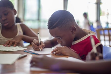 African American student doing work