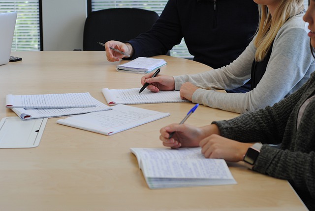 Meeting in school with paperwork being reviewed