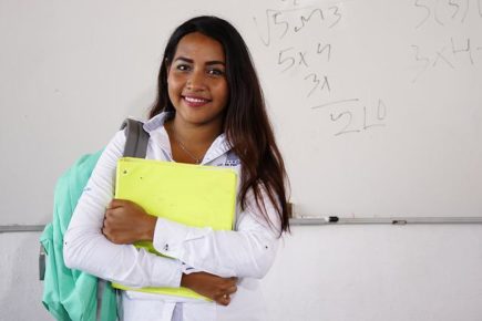 Female east indian student smiling