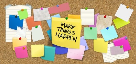 bulletin-board-with "Make Things Happen" on it