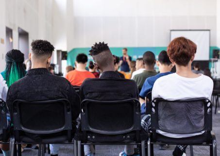 Classroom with backs of teens toward front of class