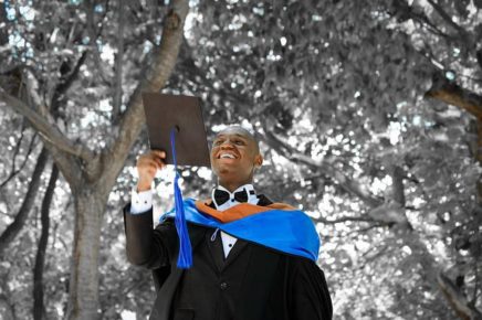 Black man with cap and gown