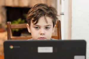 boy in front of computer