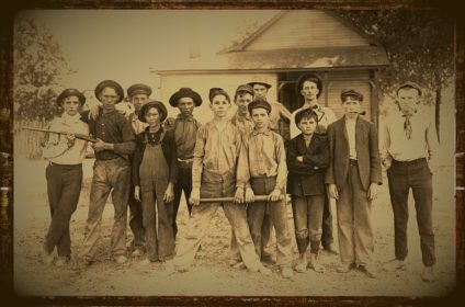 Old picture of boys outside with tools