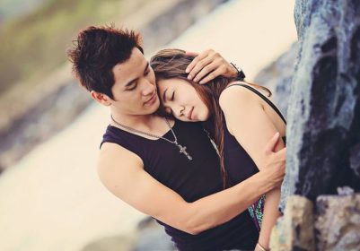 Asian couple hugging