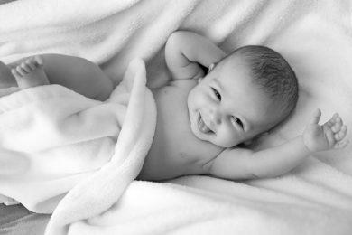 Baby boy, black white photo, in blanket